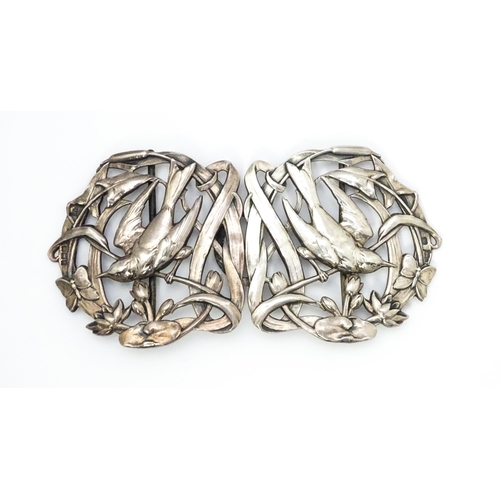 559 - An Art Nouveau two part silver buckle with bird decoration, hallmarked Sheffield 1904, maker Walker ... 