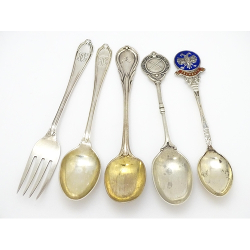 574 - Assorted silver items to include a spoon and fork hallmarked Sheffield 1930, maker James Deakin & So... 