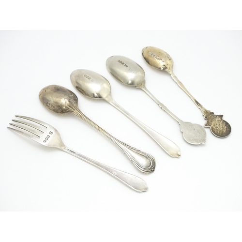 574 - Assorted silver items to include a spoon and fork hallmarked Sheffield 1930, maker James Deakin & So... 