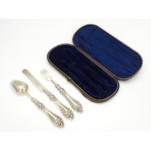 580 - A Victorian silver Christening set comprising knife, fork and spoon hallmarked Birmingham 1860, make... 