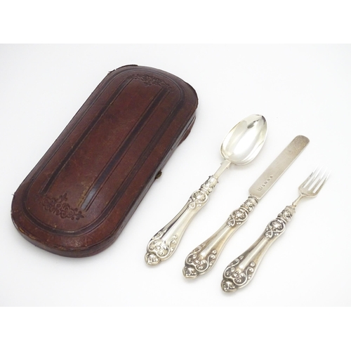 580 - A Victorian silver Christening set comprising knife, fork and spoon hallmarked Birmingham 1860, make... 