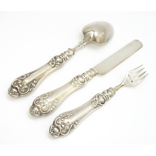 580 - A Victorian silver Christening set comprising knife, fork and spoon hallmarked Birmingham 1860, make... 