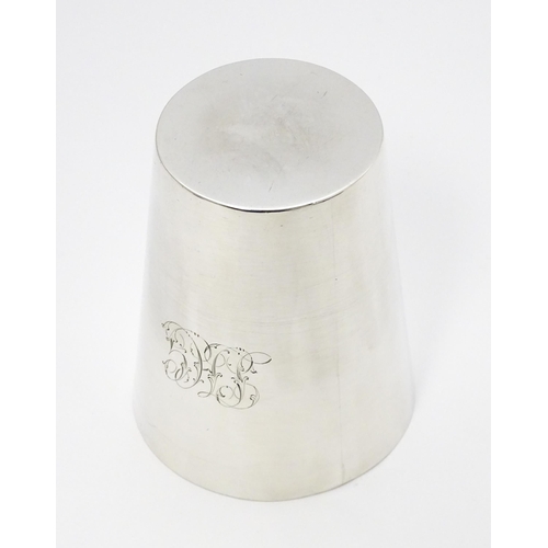 606 - A Victorian silver beaker hallmarked London 1886, maker Charles Stuart Harris. Approx. 3 1/2