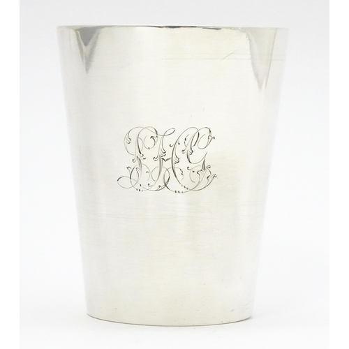 606 - A Victorian silver beaker hallmarked London 1886, maker Charles Stuart Harris. Approx. 3 1/2