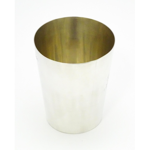 606 - A Victorian silver beaker hallmarked London 1886, maker Charles Stuart Harris. Approx. 3 1/2
