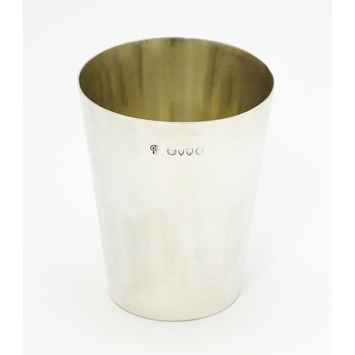 606 - A Victorian silver beaker hallmarked London 1886, maker Charles Stuart Harris. Approx. 3 1/2