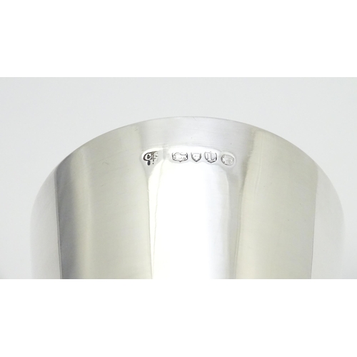 606 - A Victorian silver beaker hallmarked London 1886, maker Charles Stuart Harris. Approx. 3 1/2