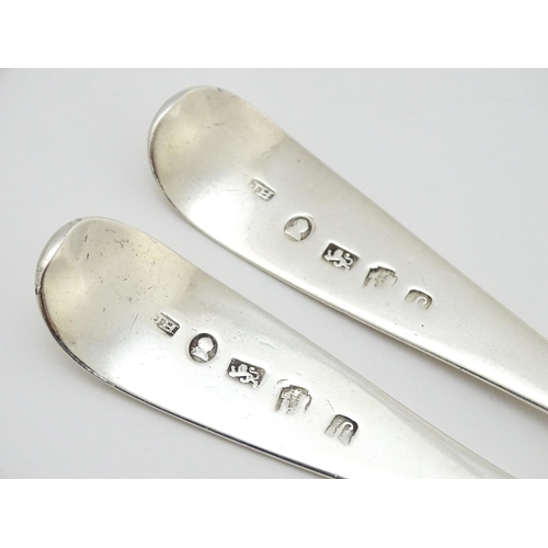 610 - A pair of Geo IV silver serving spoons, hallmarked Exeter 1822, maker Joseph Hicks. Approx. 8 1/2