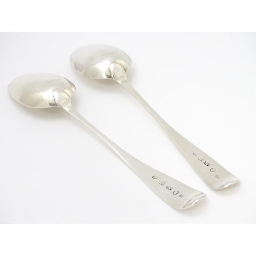 610 - A pair of Geo IV silver serving spoons, hallmarked Exeter 1822, maker Joseph Hicks. Approx. 8 1/2