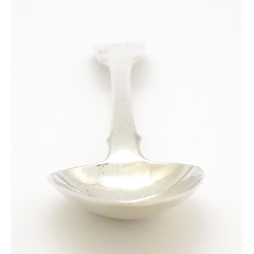 613 - A silver Fiddle pattern table spoon hallmarked London 1818, maker Richard Poulden. Approx. 8 1/2