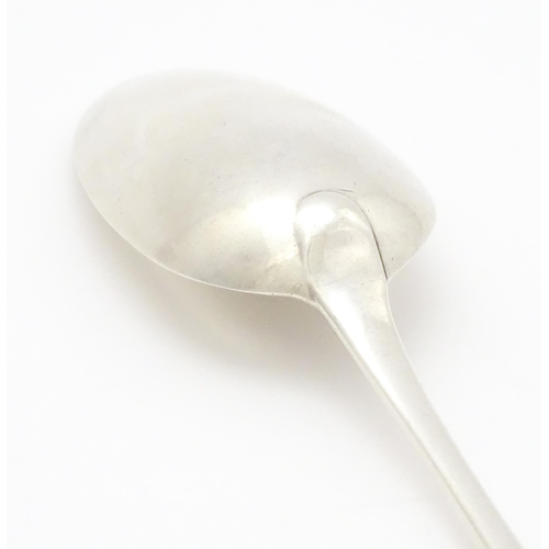 614 - A Geo III silver table spoon hallmarked London 1790, maker Richard Crossley. Approx. 8 1/2