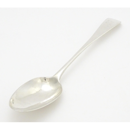 614 - A Geo III silver table spoon hallmarked London 1790, maker Richard Crossley. Approx. 8 1/2