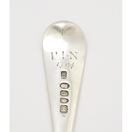 614 - A Geo III silver table spoon hallmarked London 1790, maker Richard Crossley. Approx. 8 1/2