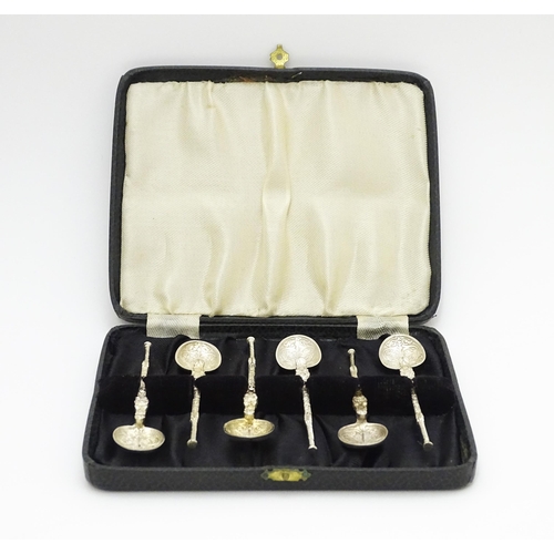 645 - A cased set of six silver teaspoons formed as replica anointing spoons, hallmarked London 1902, make... 