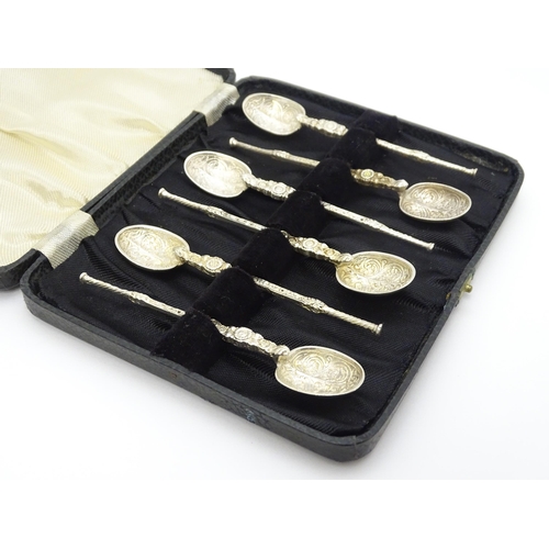 645 - A cased set of six silver teaspoons formed as replica anointing spoons, hallmarked London 1902, make... 