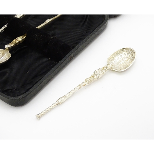 645 - A cased set of six silver teaspoons formed as replica anointing spoons, hallmarked London 1902, make... 