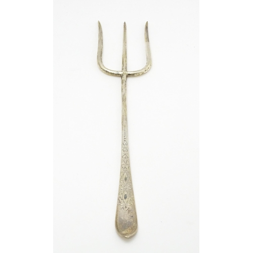 650 - A silver bread fork with bright cut decoration, hallmarked Sheffield 1915, maker C W Fletcher & Son ... 