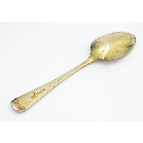 654 - A cased set of six silver gilt teaspoons with bright cut decoration hallmarked Sheffield 1902, maker... 