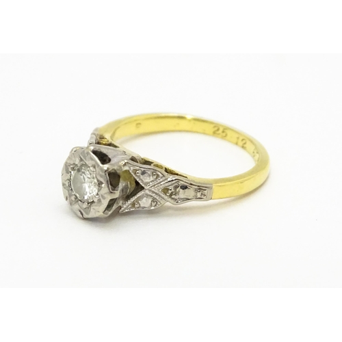 727 - An 18ct gold ring set with diamond solitaire. Ring size approx. I 1/2