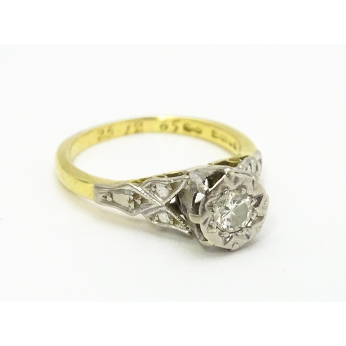 727 - An 18ct gold ring set with diamond solitaire. Ring size approx. I 1/2