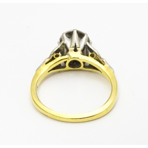 727 - An 18ct gold ring set with diamond solitaire. Ring size approx. I 1/2