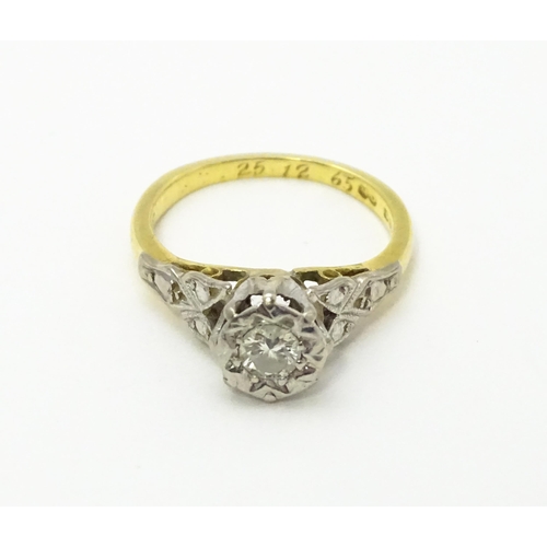 727 - An 18ct gold ring set with diamond solitaire. Ring size approx. I 1/2