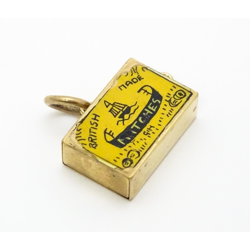 750 - A 9ct gold novelty charm / pendant modelled as a box of British made matches. Approx. 3/4