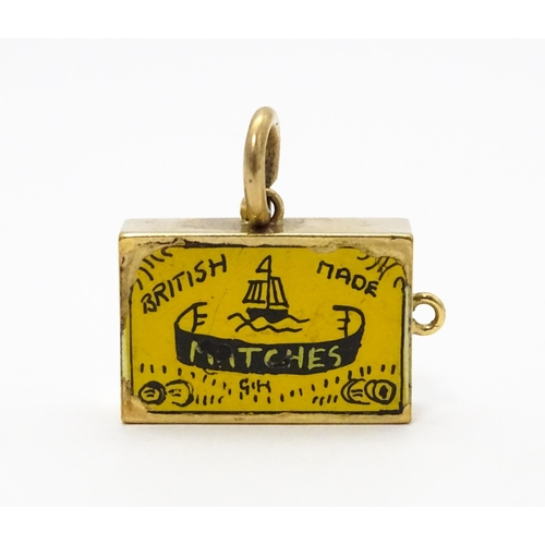 750 - A 9ct gold novelty charm / pendant modelled as a box of British made matches. Approx. 3/4