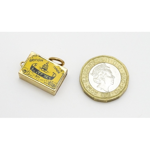 750 - A 9ct gold novelty charm / pendant modelled as a box of British made matches. Approx. 3/4