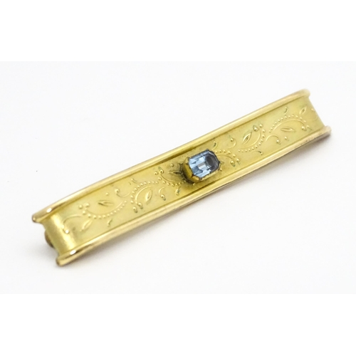 753 - A brooch set with central blue stone, maker Andreas Daub and signed Amerikaner AB. Approx. 2 1/2