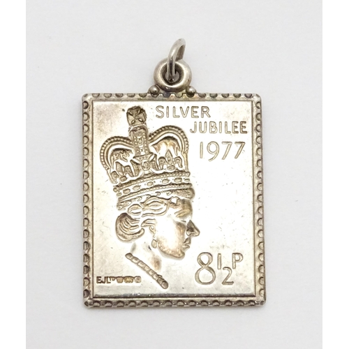 759 - A silver pendant of ingot form hallmarked London 1977 with Silver Jubilee mark, together with a hall... 