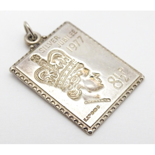 759 - A silver pendant of ingot form hallmarked London 1977 with Silver Jubilee mark, together with a hall... 