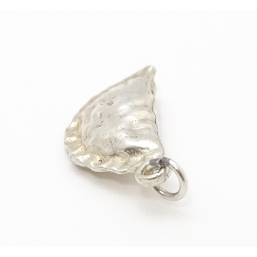 760 - A white metal charm modelled as a Cornish pasty. Approx 1