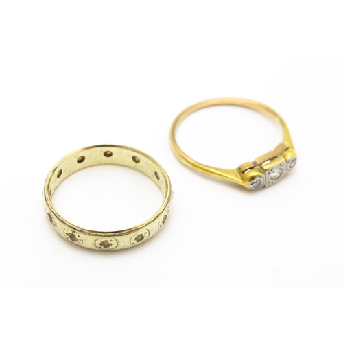 763 - A 9ct gold ring set with white stones together with a gold ring set with diamonds(2)