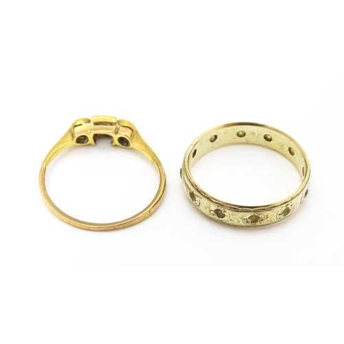 763 - A 9ct gold ring set with white stones together with a gold ring set with diamonds(2)