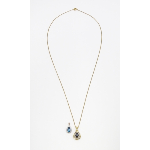 766 - A 9ct gold pendant set with central dark blue stone and chip set diamonds together with a gilt and w... 