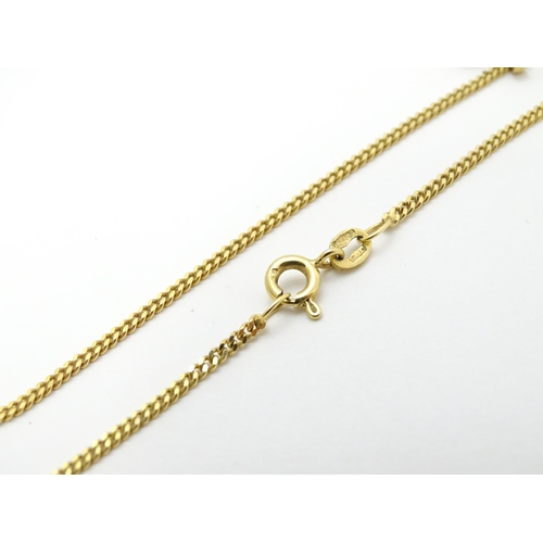 777 - A 9ct gold necklace with 9ct gold pendant of heart form set with central diamond. Chain approx. 18