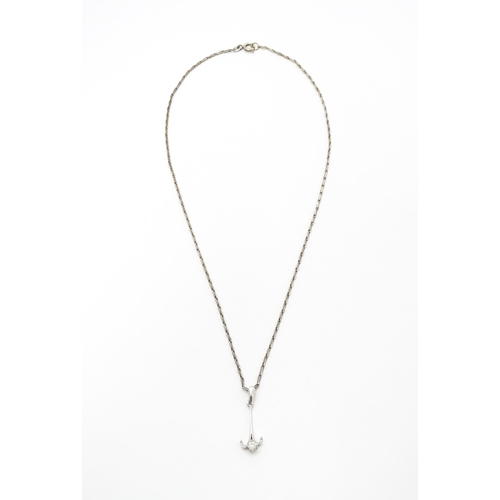 778 - A 9ct white gold pendant set with white stone detail. On a silver chain. Pendant approx. 1