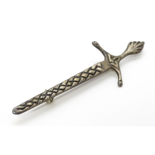 779 - Scottish Iona Jewellery: A silver brooch formed as a Celtic sword marked Iona Scotland Sterling, mak... 