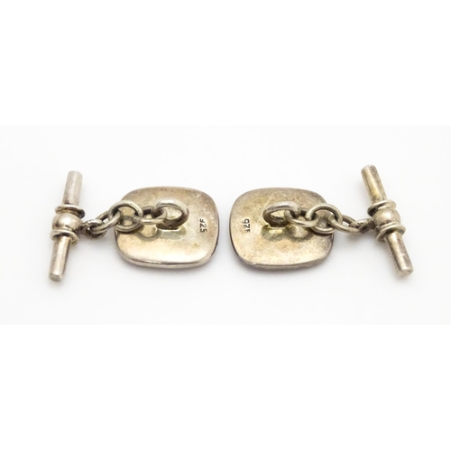 840A - Two silver studs with enamel detail hallmarked Birmingham 1987 maker Deakin & Francis. Together with... 