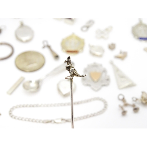 902A - A quantity of silver items to include pendants, earrings, rings, charms, salt spoon, etc. To include... 