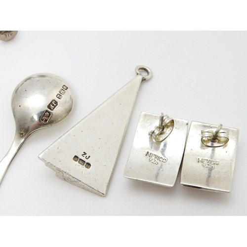 902A - A quantity of silver items to include pendants, earrings, rings, charms, salt spoon, etc. To include... 