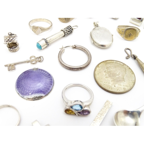 902A - A quantity of silver items to include pendants, earrings, rings, charms, salt spoon, etc. To include... 