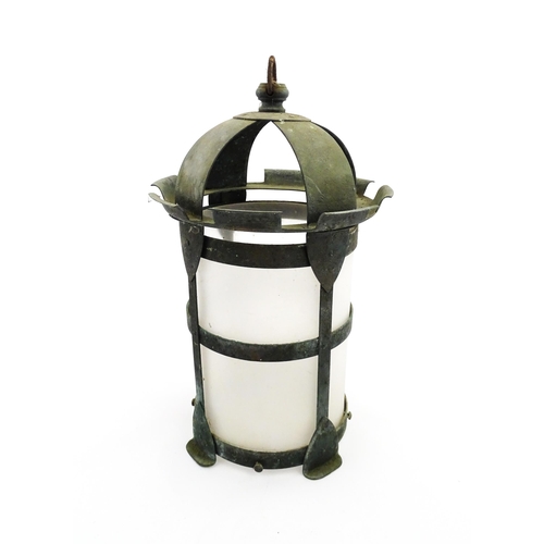 1238 - An Arts & Crafts style copper lantern with frosted glass shade. Approx. 14 1/4