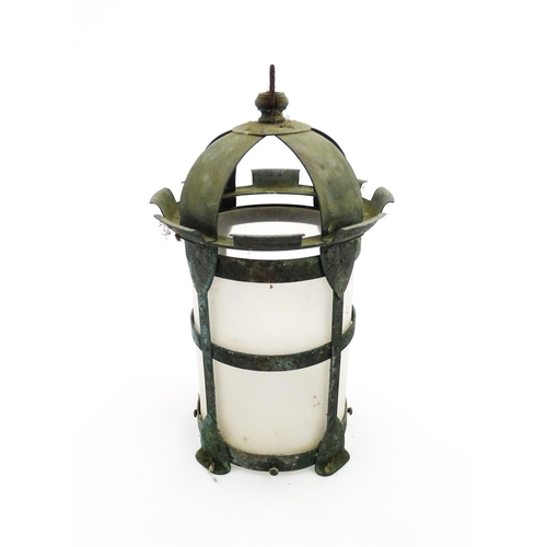 1238 - An Arts & Crafts style copper lantern with frosted glass shade. Approx. 14 1/4