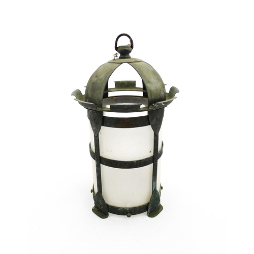 1238 - An Arts & Crafts style copper lantern with frosted glass shade. Approx. 14 1/4