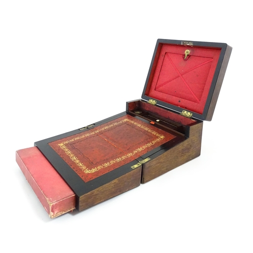 1286 - A Victorian rosewood workbox with inlaid mother of pearl escutcheon and plaque to top, opening to re... 