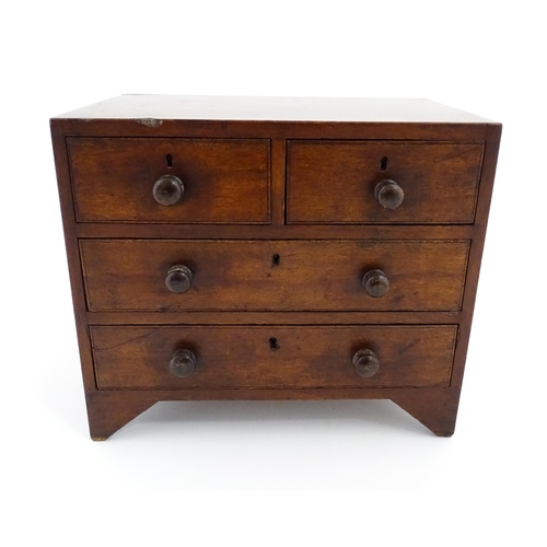 1288 - A 19thC mahogany apprentice piece chest of drawers comprising two short over two long drawers. Appro... 