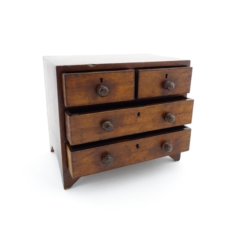 1288 - A 19thC mahogany apprentice piece chest of drawers comprising two short over two long drawers. Appro... 