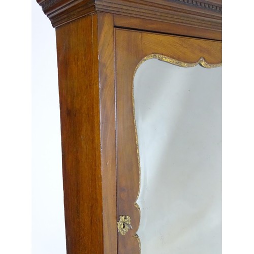 1533 - A mid 18thC mahogany bureau bookcase with a moulded cornice above a dentil frieze and shaped mirrore... 